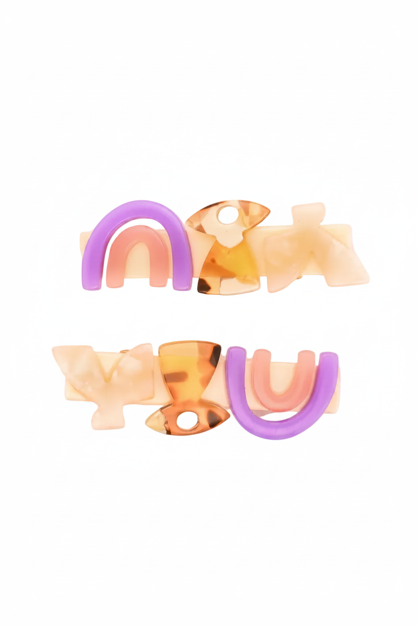 Colorful resin jewelry pieces on a white background